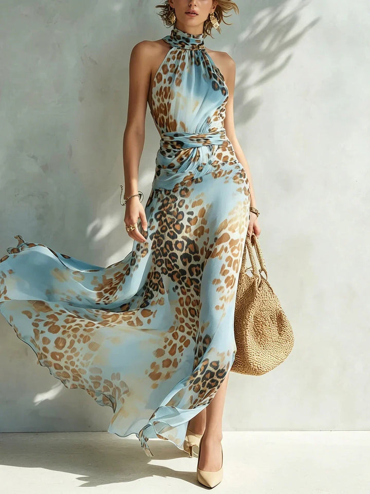 Woman wearing leopard halter neck maxi dress