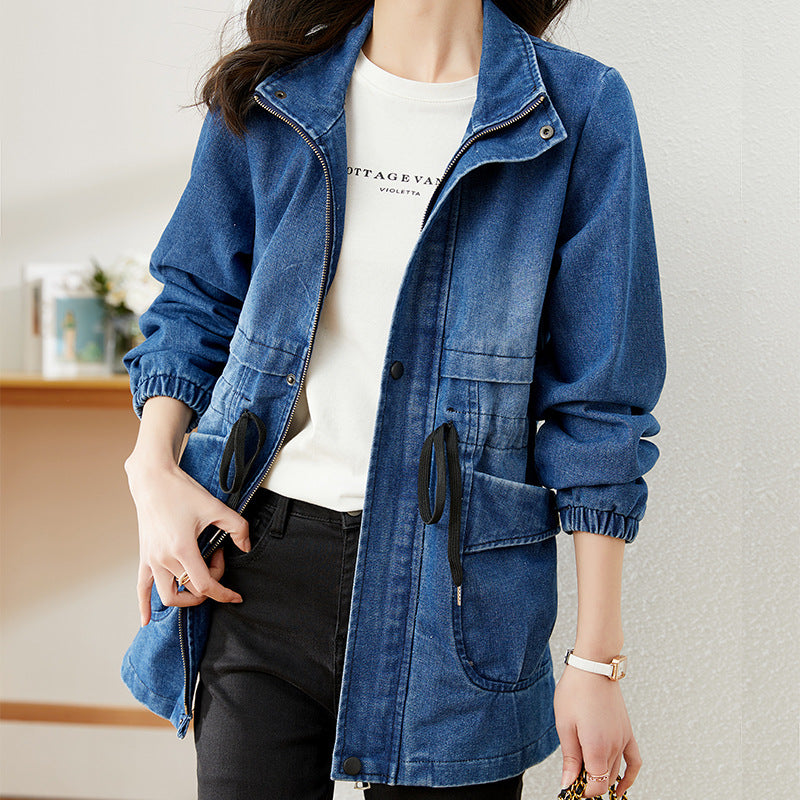 Woman wearing blue denim jacket with drawstring waist