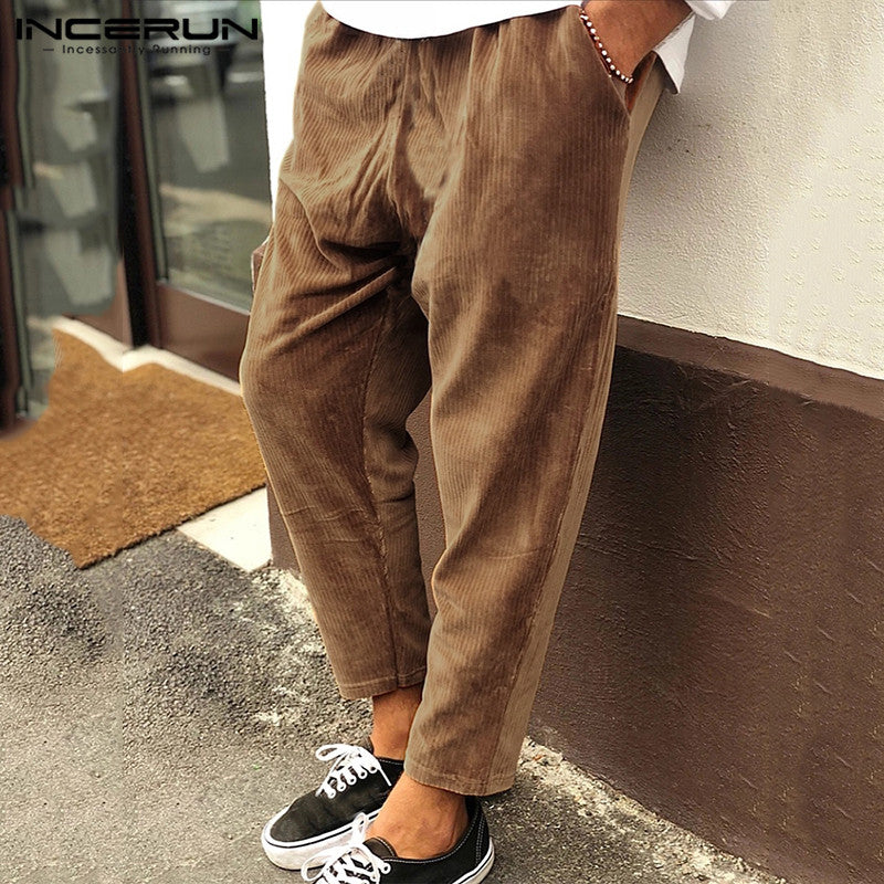 Woman wearing solid color wide leg casual pants outdoors