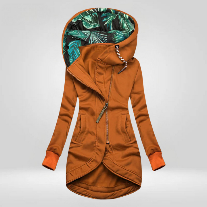 Woman wearing hooded rain coat with slim fit
