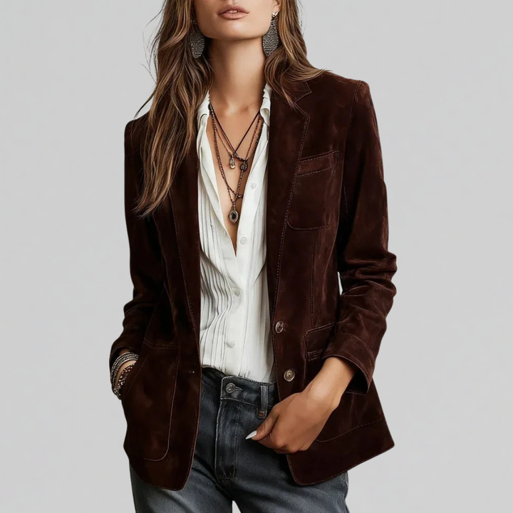 Woman wearing relaxed tailored brown blazer jacket