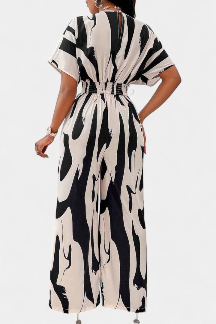 Wide-Leg Jumpsuit | V-Neck Design | Abstract Print | Comfortable and Chic Style