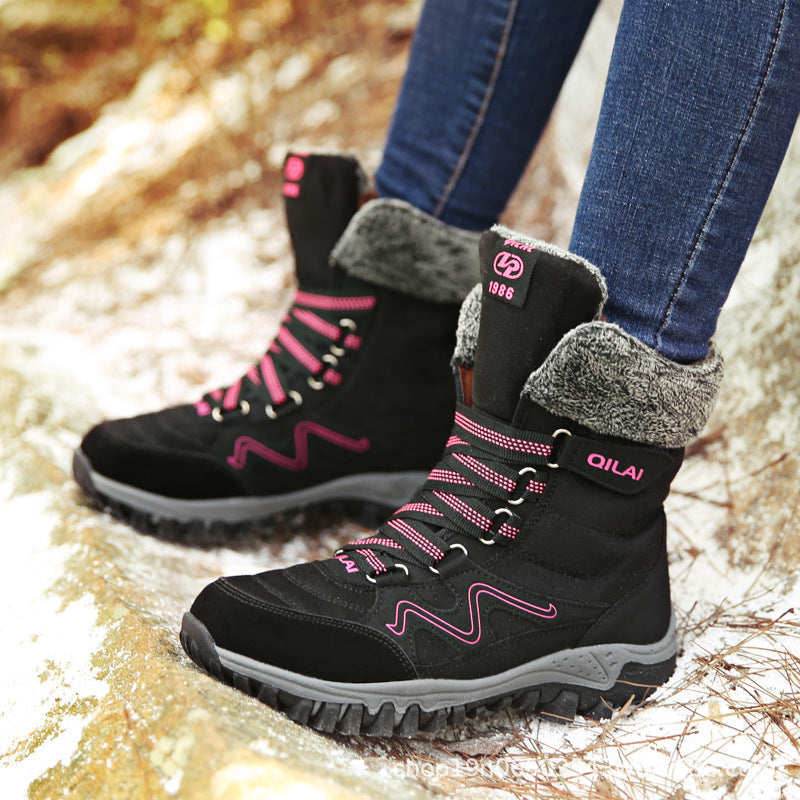 Woman wearing black lace-up winter ankle boots