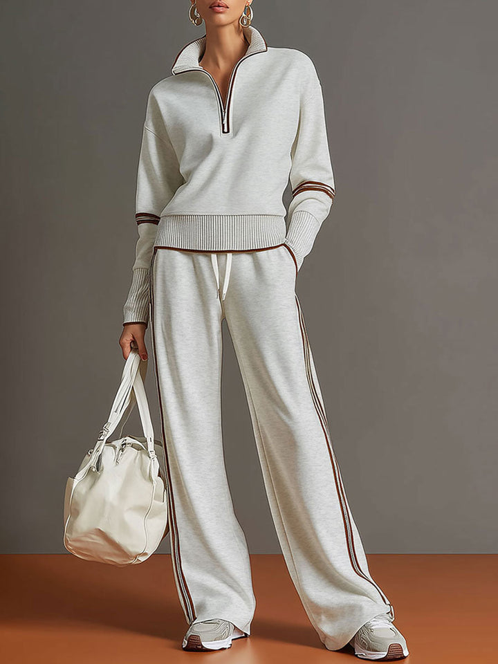 Woman wearing wide leg pants and blouse two-piece set