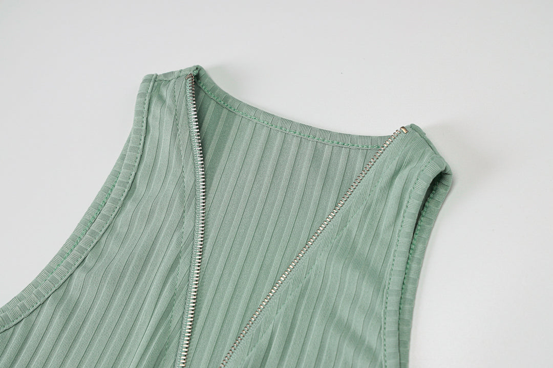 Woman wearing sleeveless striped knit mini dress