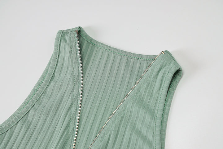 Woman wearing sleeveless striped knit mini dress