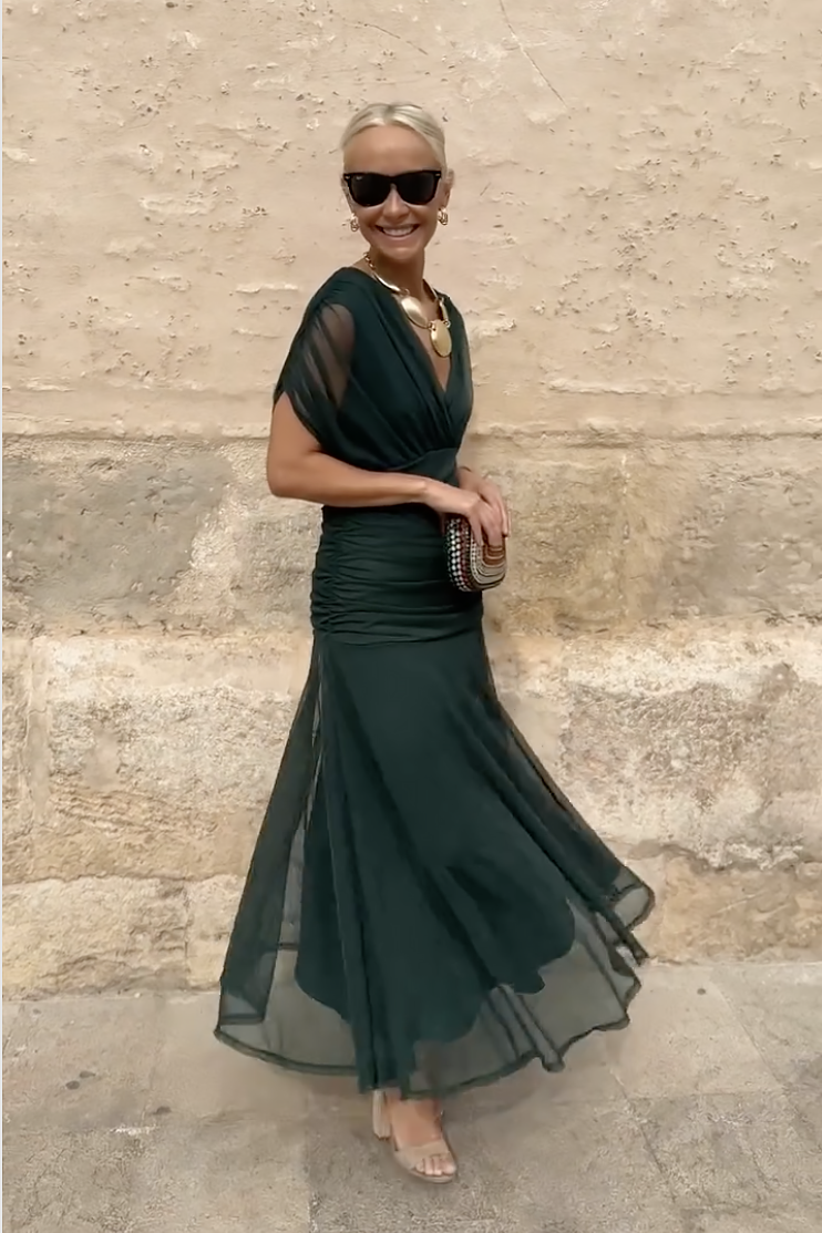 Woman wearing floral print V-neck maxi dress