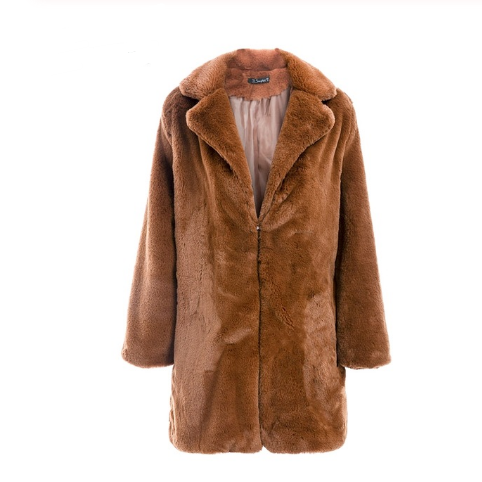 Woman wearing long faux fur coat in streetwear style