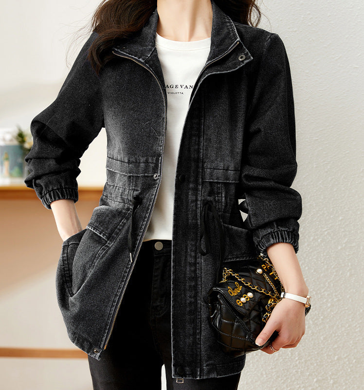 Woman wearing blue denim jacket with drawstring waist