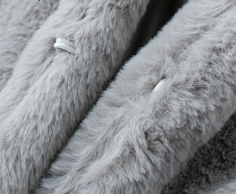 Woman wearing long faux fur coat in streetwear style