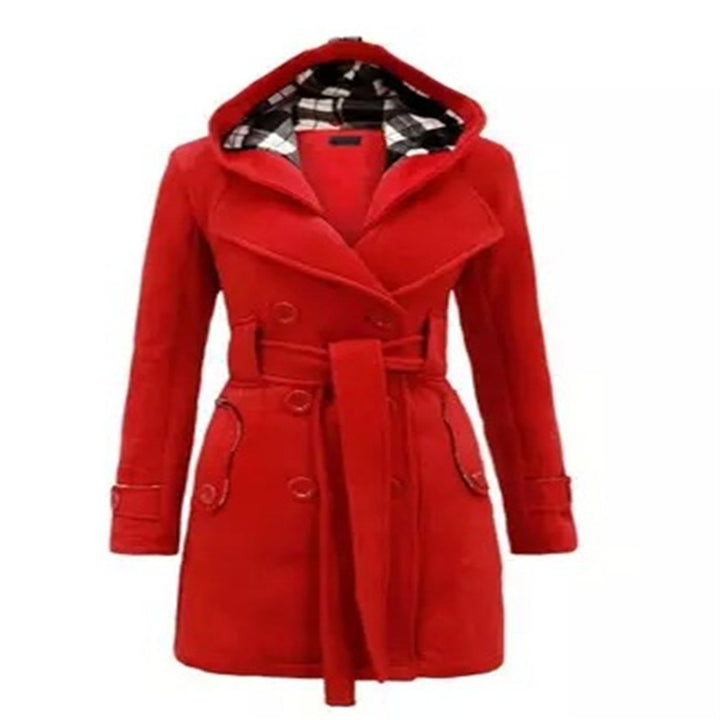 Woman wearing double-breasted winter coat with large collar