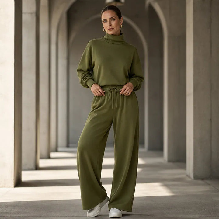 Woman wearing black turtleneck two-piece set with wide-leg trousers