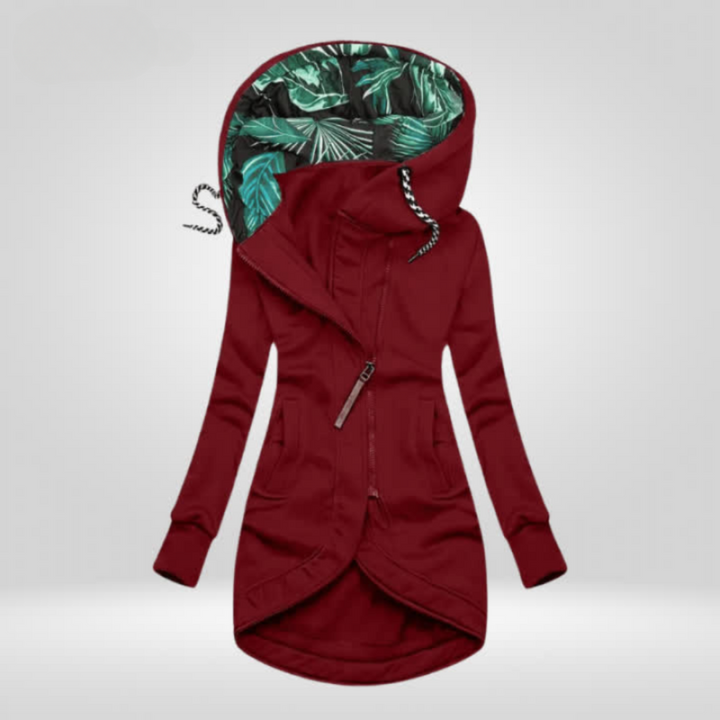 Woman wearing hooded rain coat with slim fit