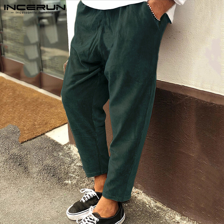 Woman wearing solid color wide leg casual pants outdoors