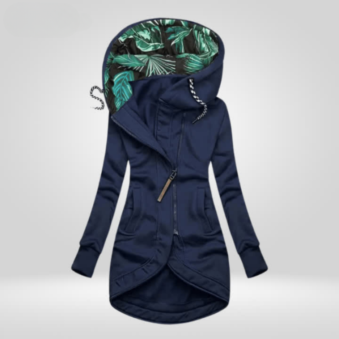 Woman wearing hooded rain coat with slim fit