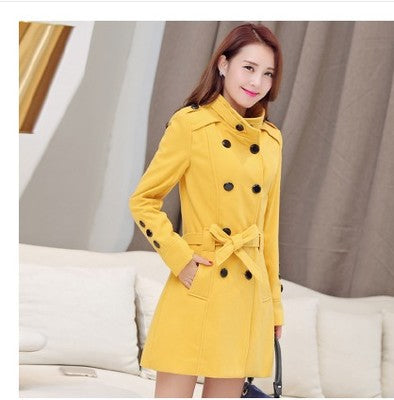 Woman wearing double breasted slim fit winter coat