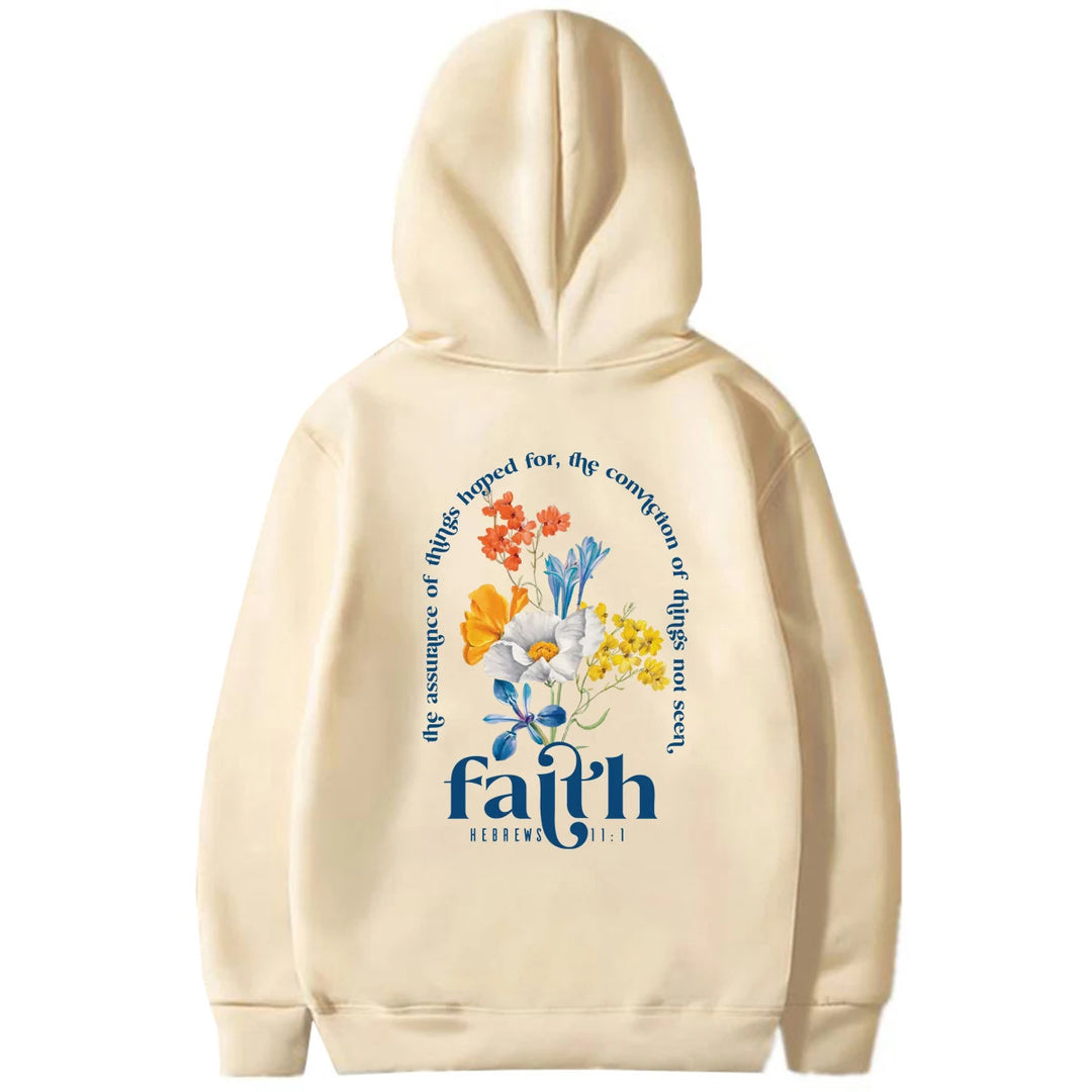 Woman wearing Bible verse graphic hoodie with long sleeves