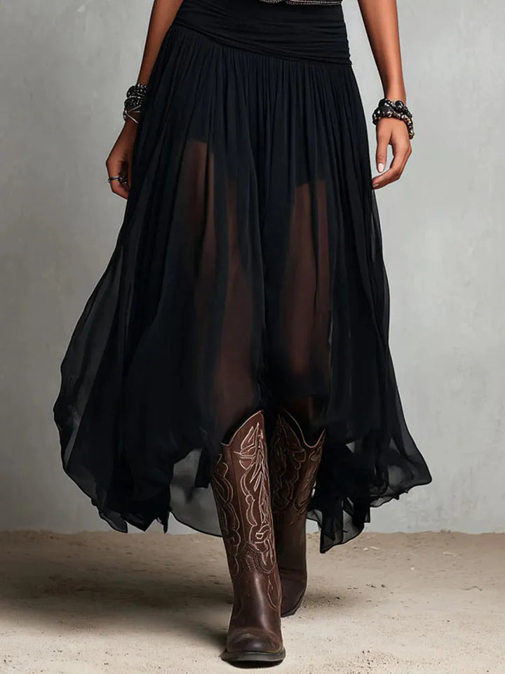 Woman wearing double layer maxi dress with sheer overlay