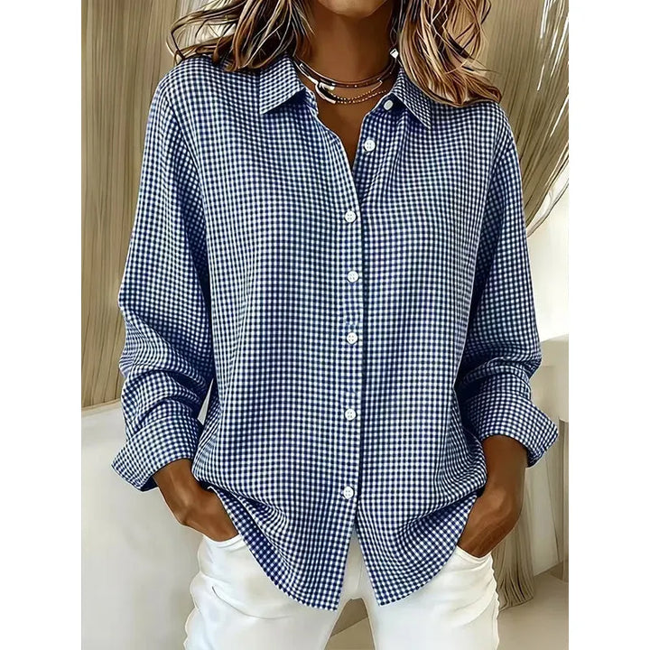 Woman wearing gingham button-front blouse with long sleeves