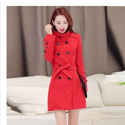 Woman wearing double breasted slim fit winter coat