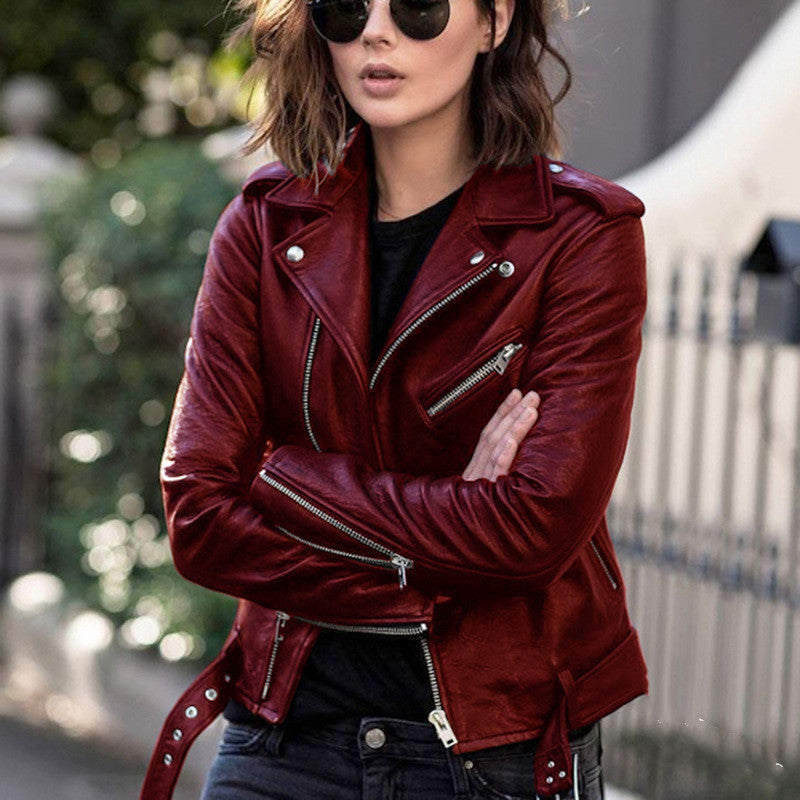 Woman wearing short zip jacket with lapel collar