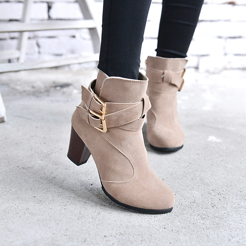 Women's heeled ankle boots with side zipper and belt buckle