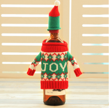 Knitted Christmas wine bottle covers in four festive designs