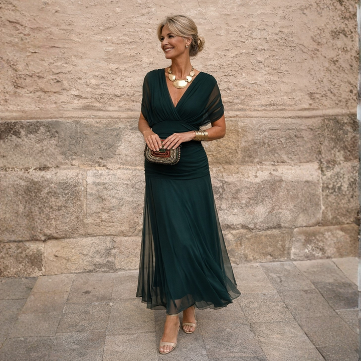Woman wearing draped V-neck maxi dress