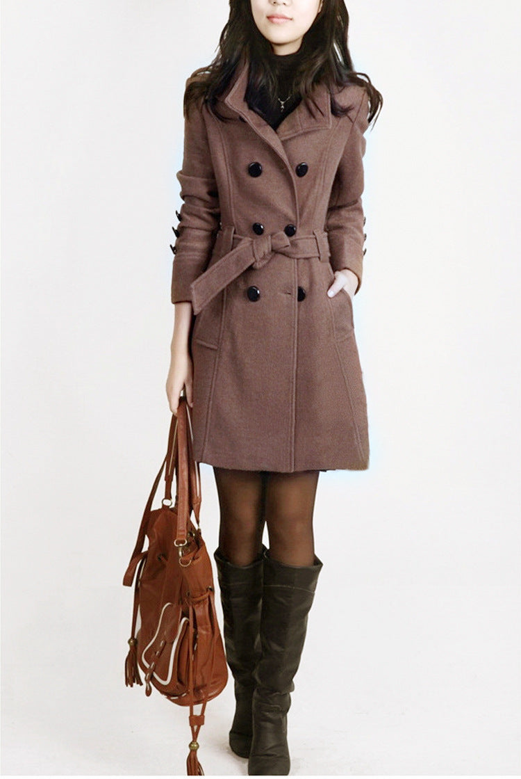 Woman wearing double breasted slim fit winter coat