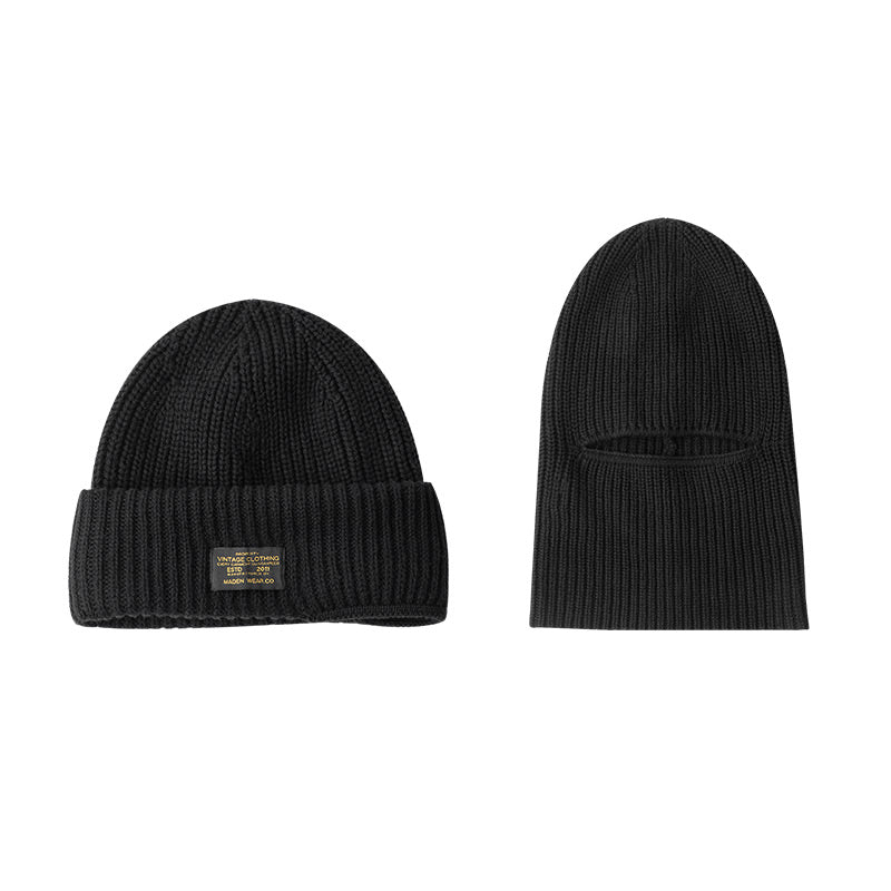Black knitted beanie with street style patch detail