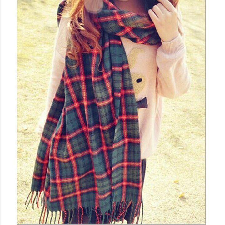 Woman wearing multi-style winter shawl scarf outdoors