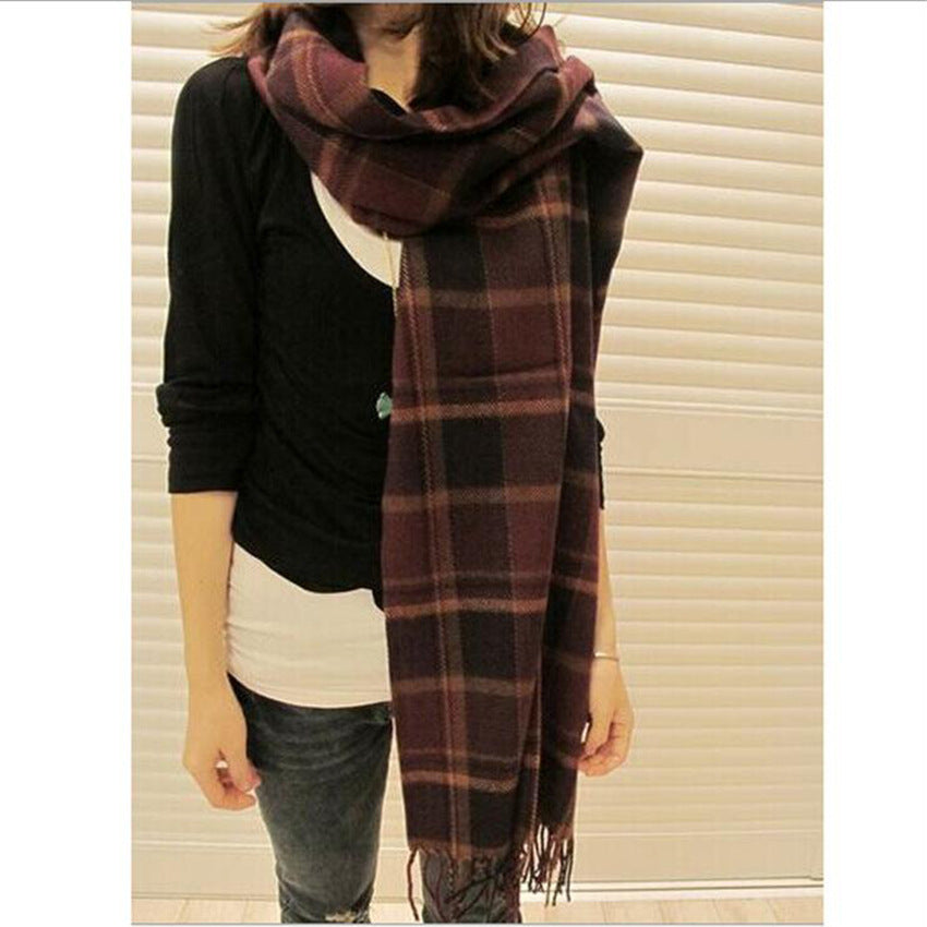 Woman wearing multi-style winter shawl scarf outdoors