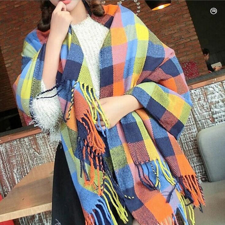 Woman wearing multi-style winter shawl scarf outdoors
