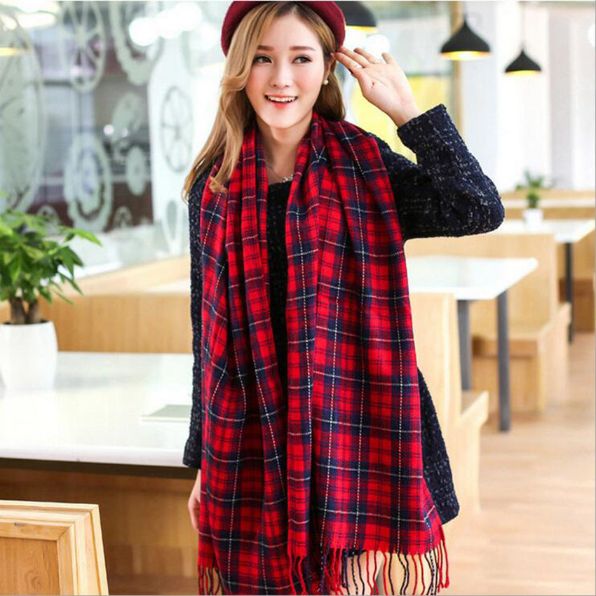 Woman wearing multi-style winter shawl scarf outdoors