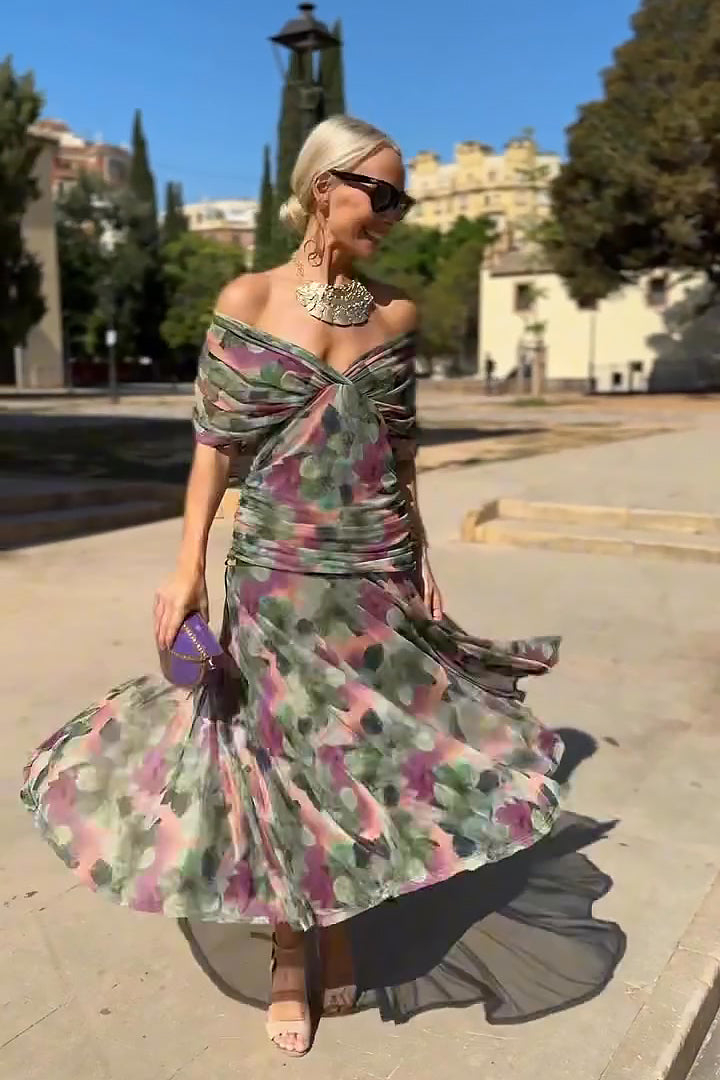 Woman wearing floral print V-neck maxi dress