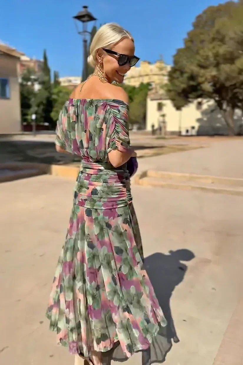 Woman wearing floral print V-neck maxi dress