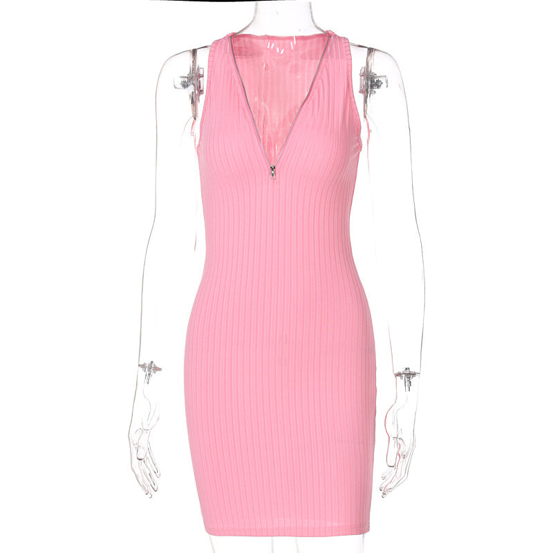 Woman wearing sleeveless striped knit mini dress