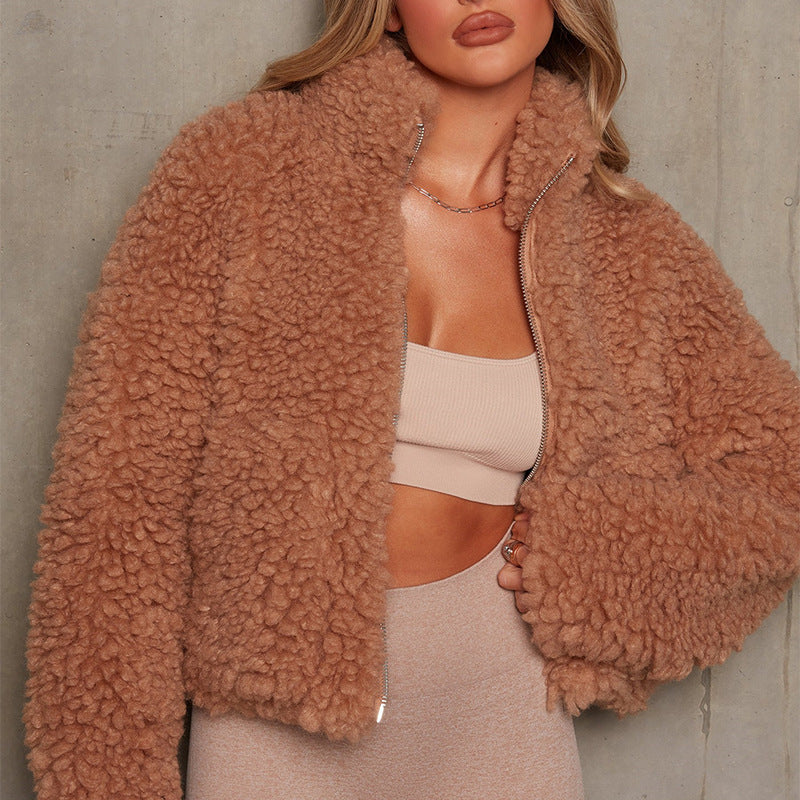 Women's short cardigan jacket on model, front view