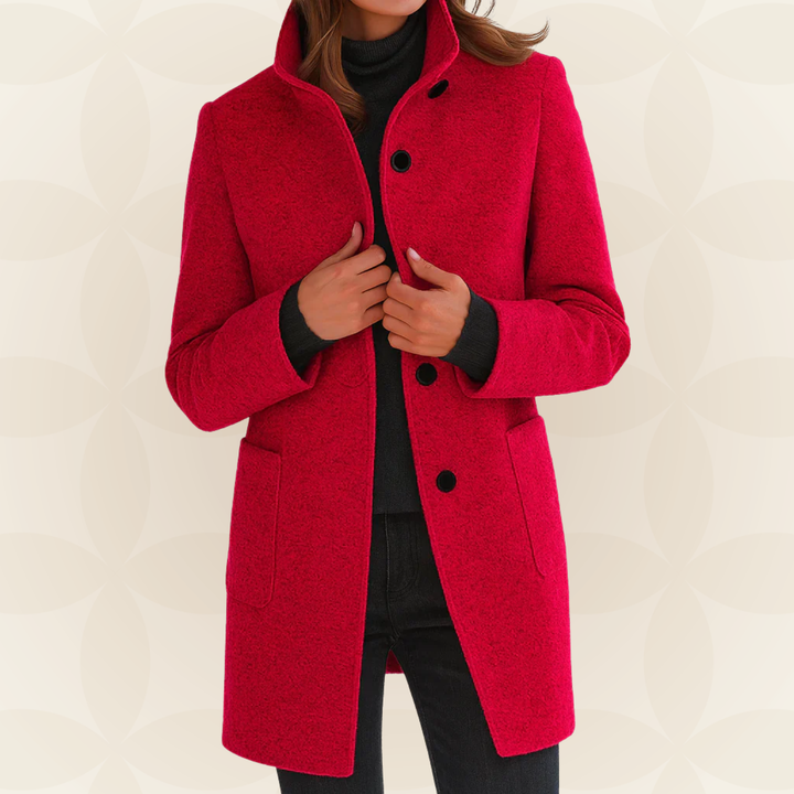 Woman wearing high collar button front coat outdoors