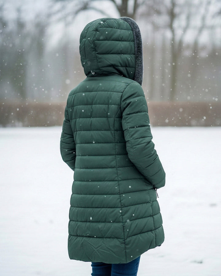 Woman wearing fleece-lined A-line puffer coat