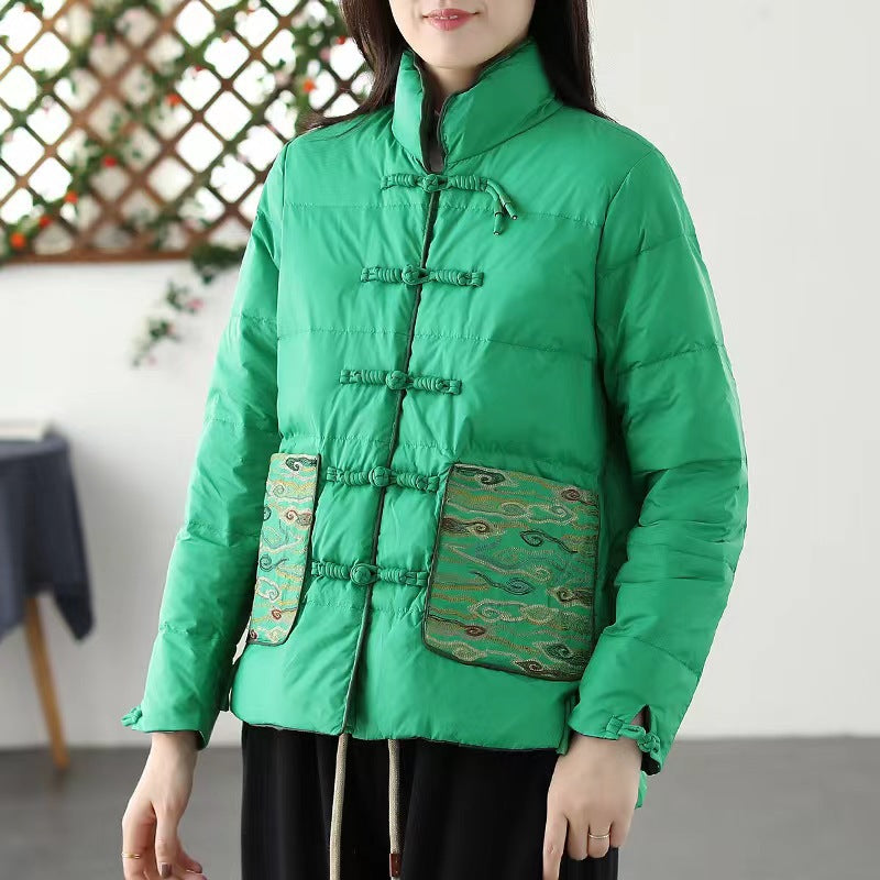 Woman wearing short embroidered down jacket with long sleeves