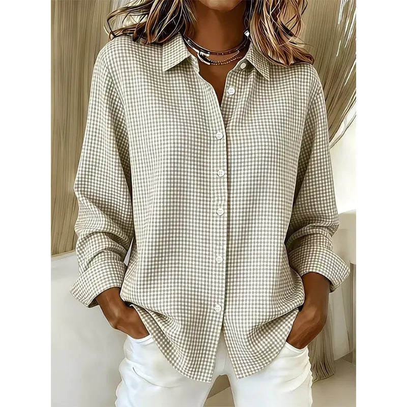 Woman wearing gingham button-front blouse with long sleeves