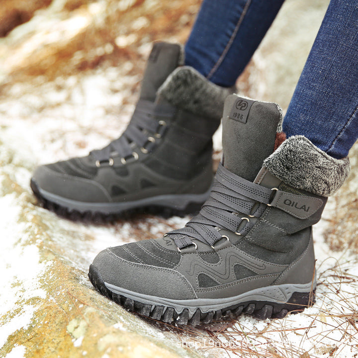 Woman wearing black lace-up winter ankle boots