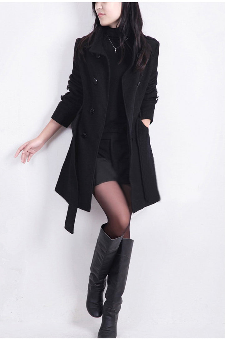 Woman wearing double breasted slim fit winter coat