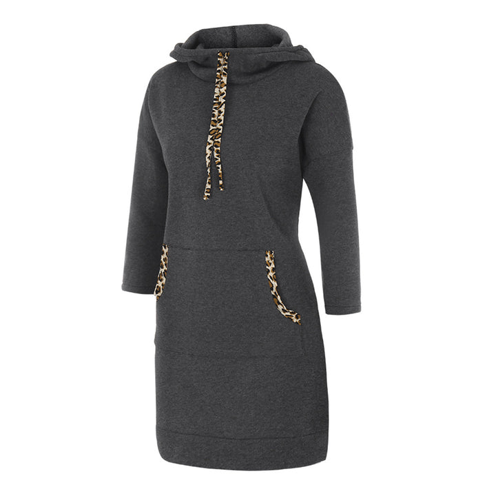 Woman wearing hooded sweatshirt dress with leopard-print drawstrings
