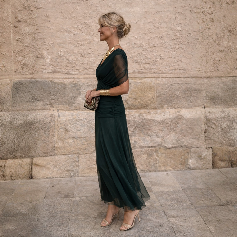 Woman wearing draped V-neck maxi dress