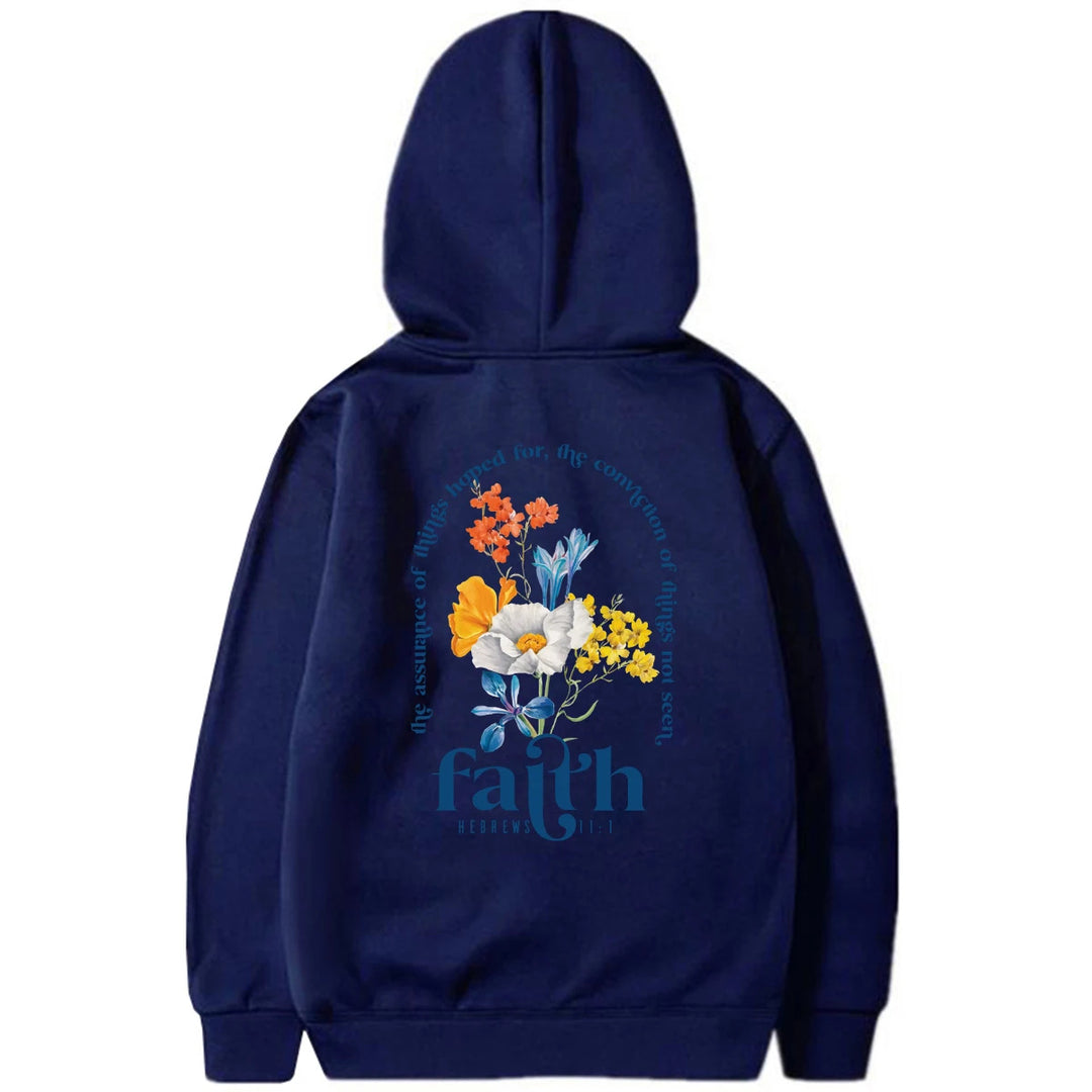 Woman wearing Bible verse graphic hoodie with long sleeves