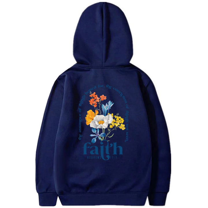 Woman wearing Bible verse graphic hoodie with long sleeves