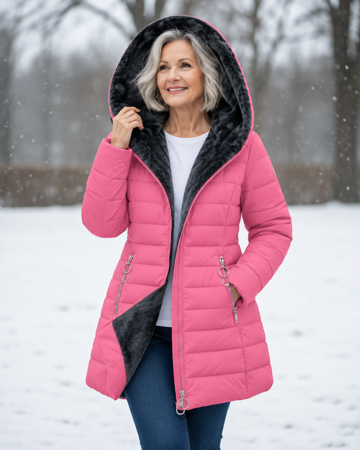 Woman wearing quilted hooded winter coat with A-line fit