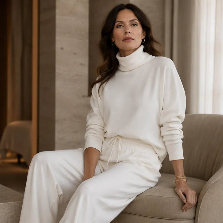 Woman wearing black turtleneck two-piece set with wide-leg trousers